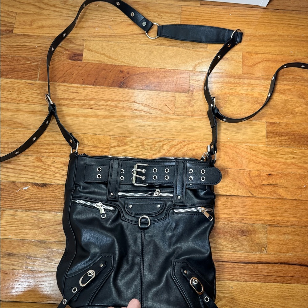 Black Leather Grommet Bag